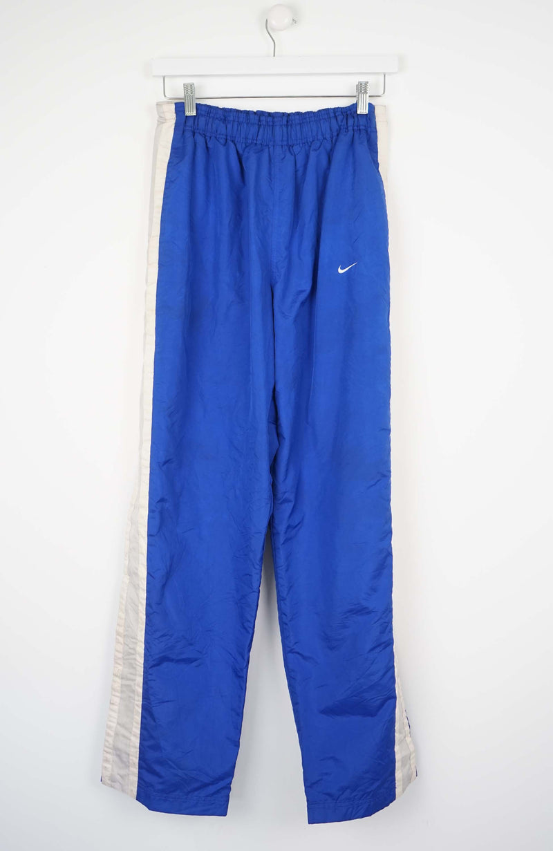 Nike snap track pants sale
