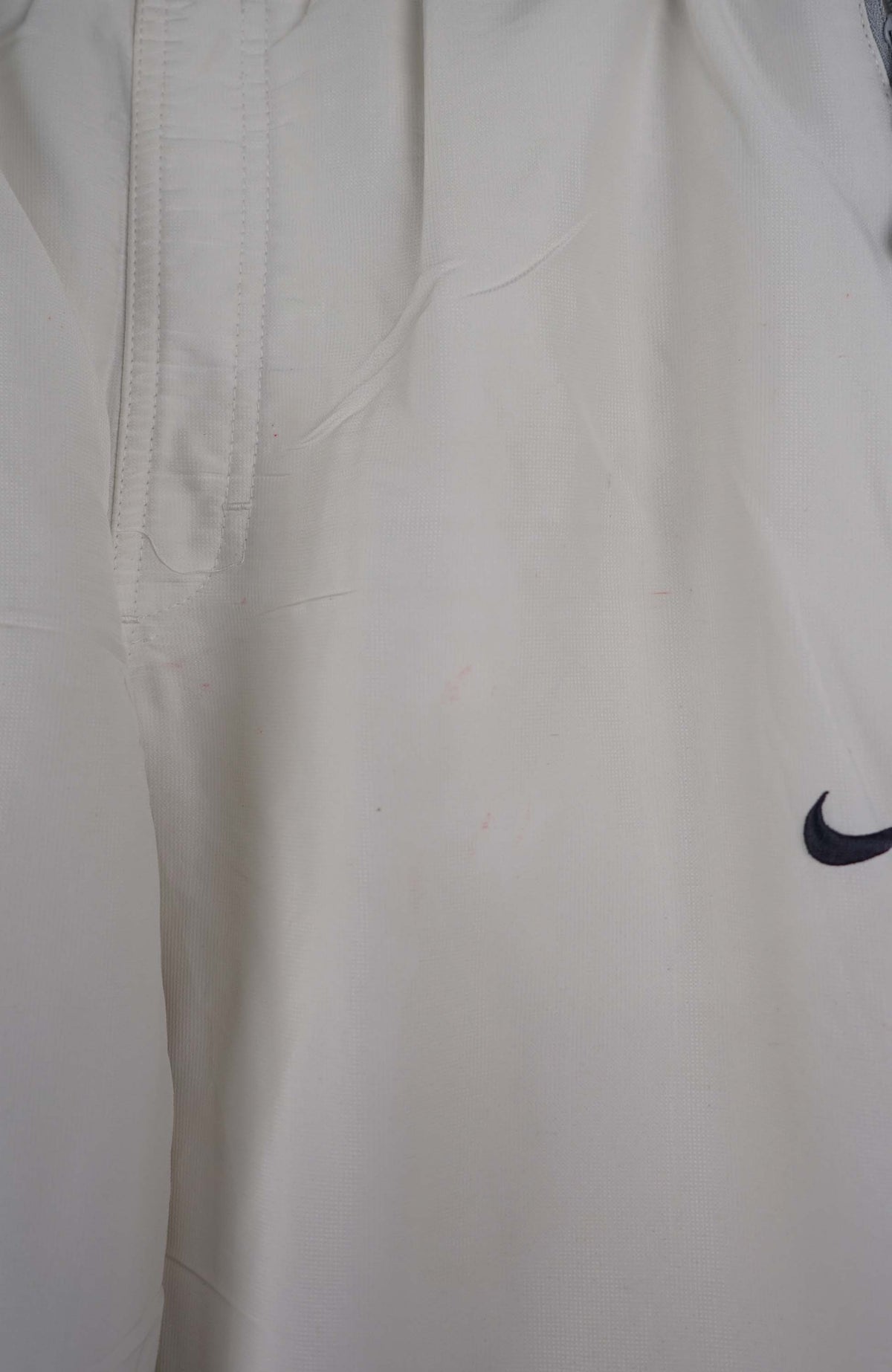 VINTAGE NIKE TRACK PANTS (L)