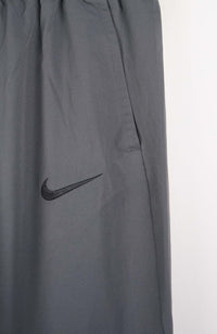 VINTAGE NIKE TRACK PANTS (M)