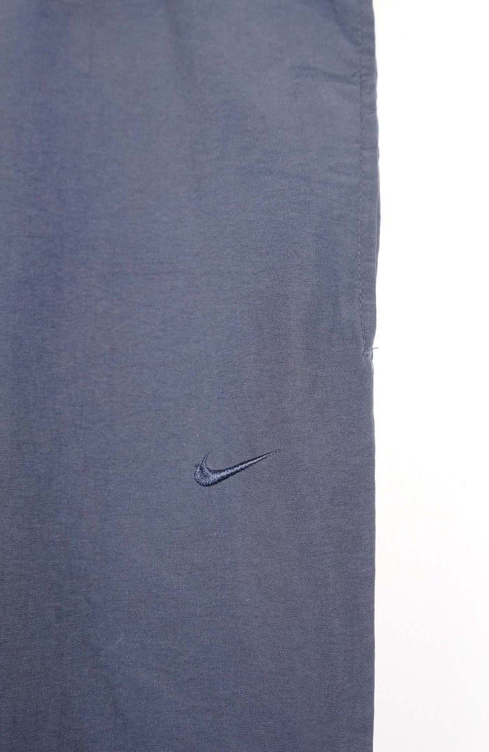 VINTAGE NIKE TRACK PANTS (XL)