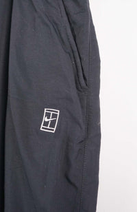 VINTAGE NIKE TRACK PANTS (XL)