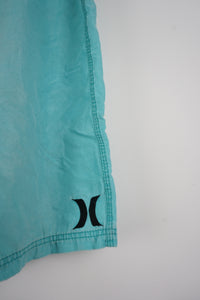 VINTAGE HURLEY BOARD SHORTS W34