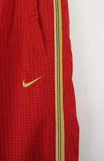 VINTAGE NIKE TRACK PANTS (S)