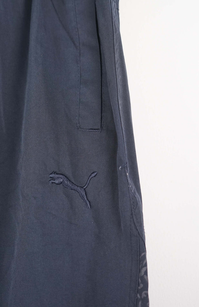 VINTAGE PUMA 3/4 TRACK PANT SHORTS (M)