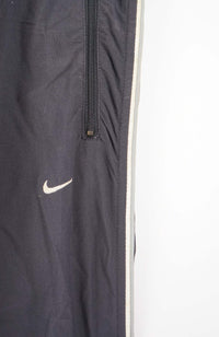 VINTAGE NIKE TRACK PANTS (XL)