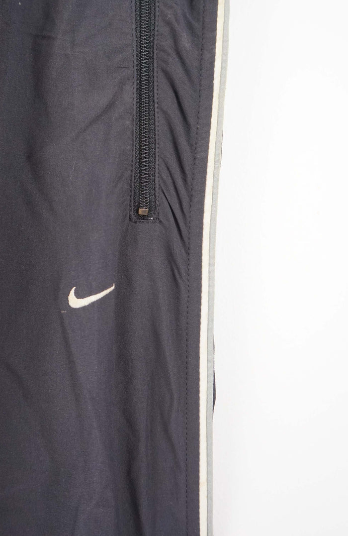 VINTAGE NIKE TRACK PANTS (XL)
