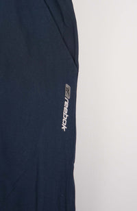 VINTAGE REEBOK TRACK PANTS (L)