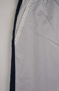 VINTAGE FILA TRACK PANTS (XS)