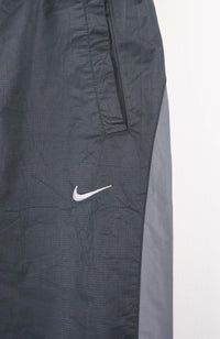 VINTAGE NIKE TRACK PANTS (S)