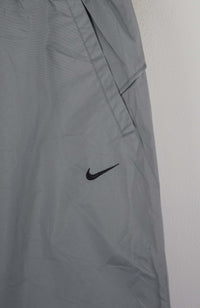 VINTAGE NIKE TRACK PANTS (M)