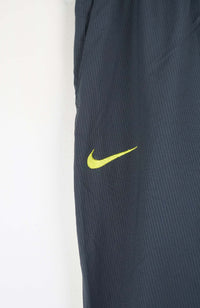 VINTAGE NIKE TRACK PANTS (L)