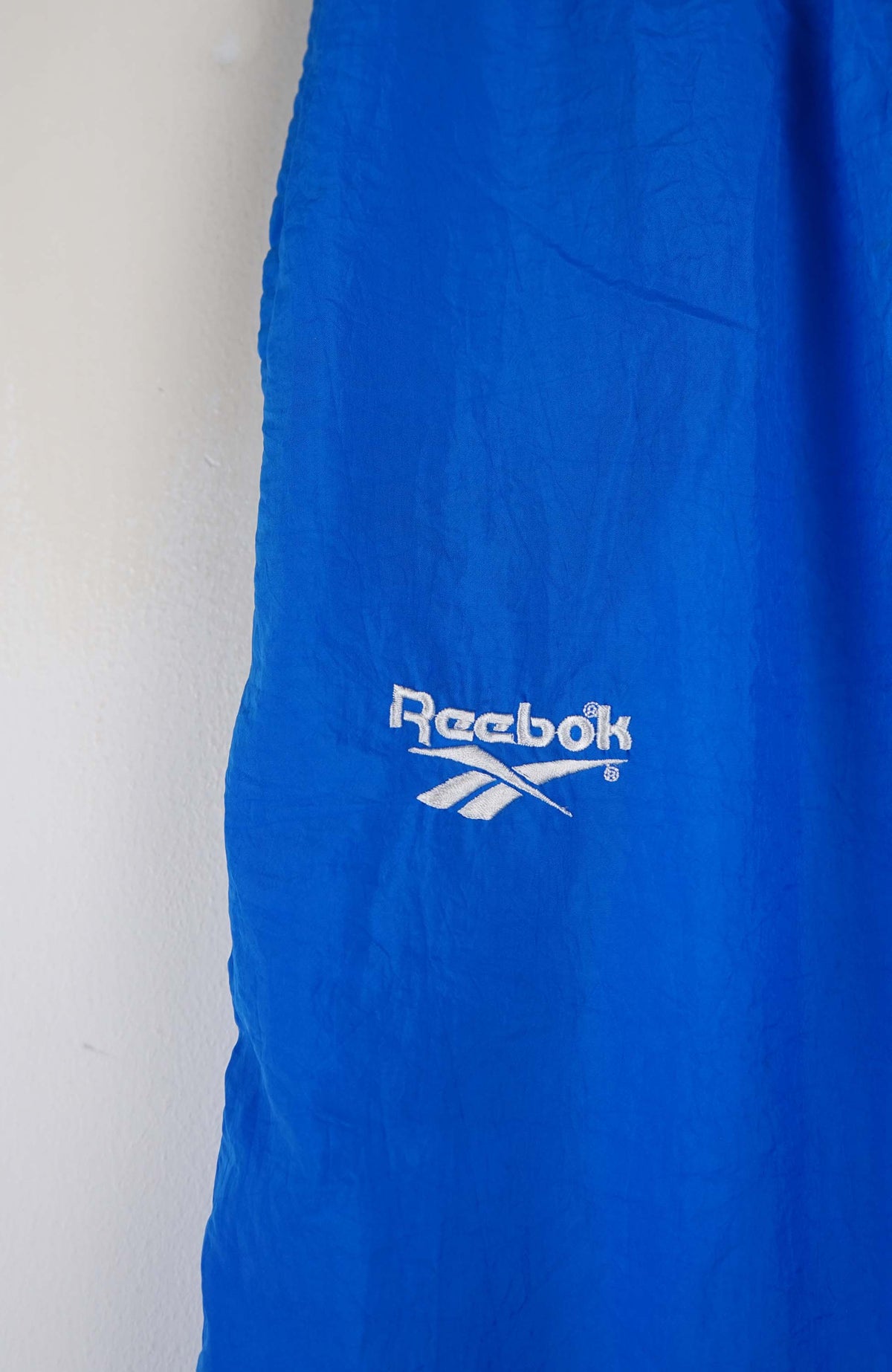 VINTAGE REEBOK TRACK PANT SHORTS (S)