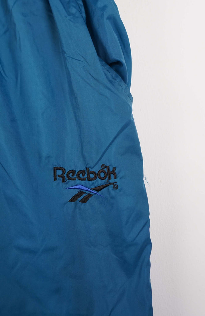 VINTAGE REEBOK TRACK PANT SHORTS (M)