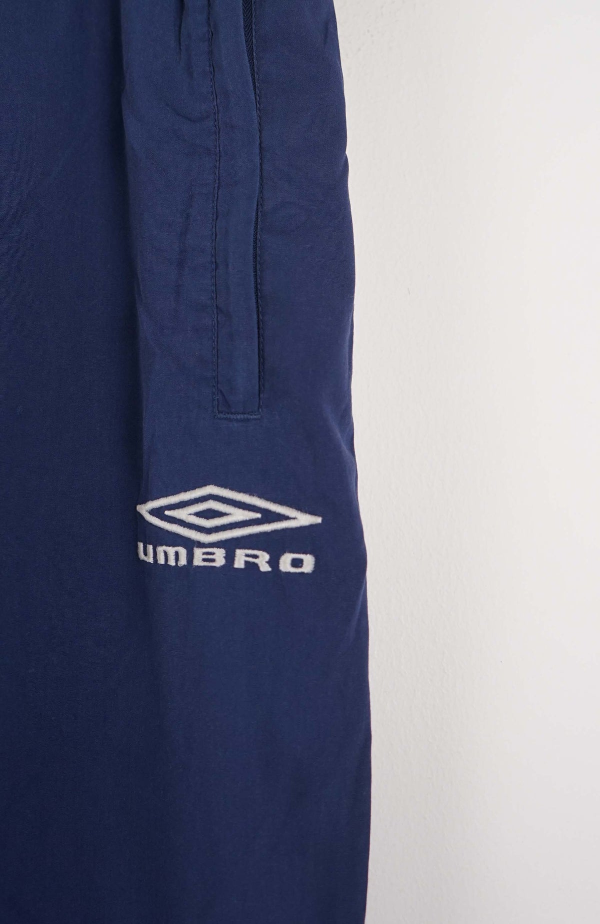 VINTAGE UMBRO TRACK PANTS (L)