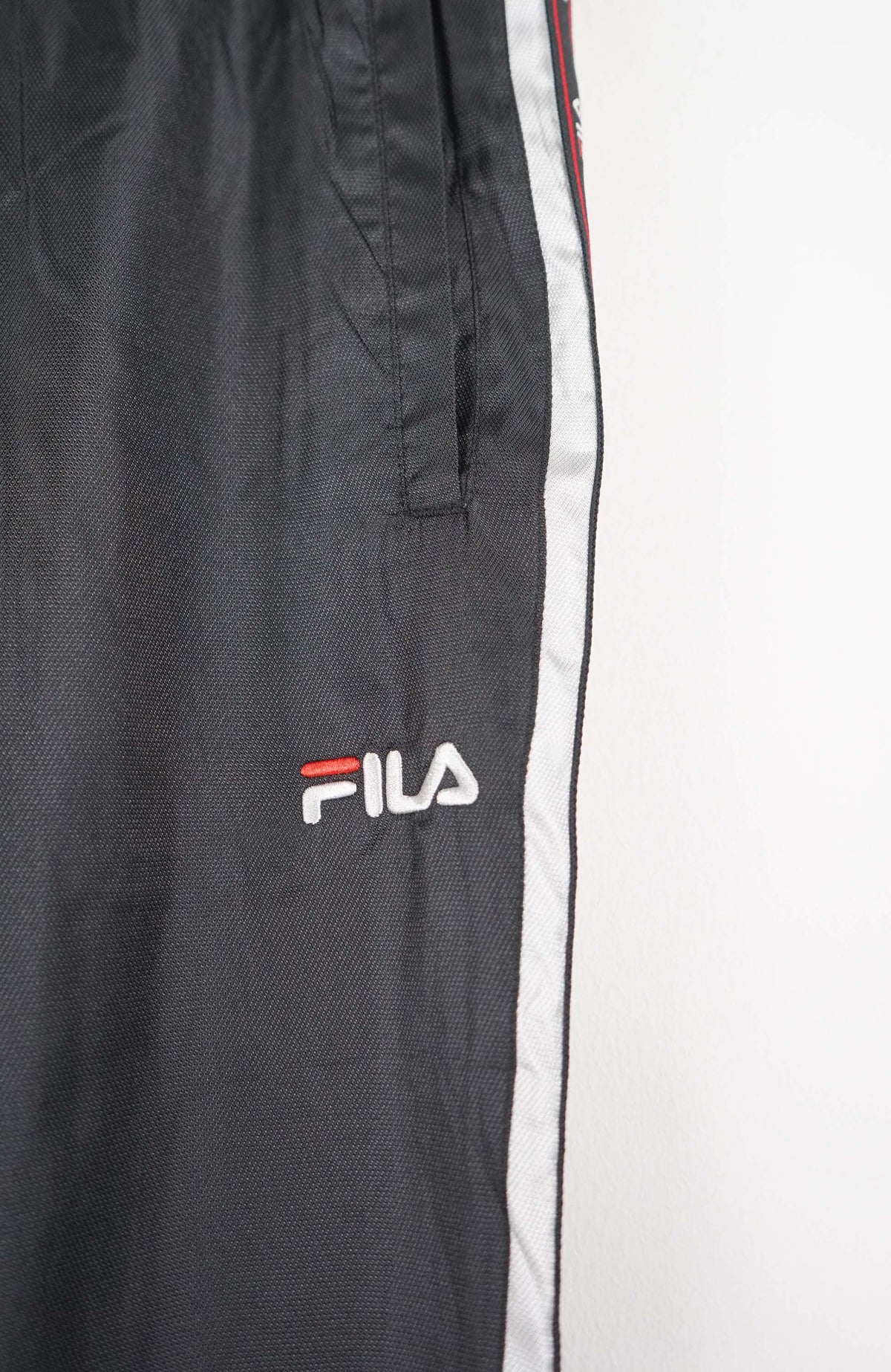 VINTAGE FILA TRACK PANTS (S)