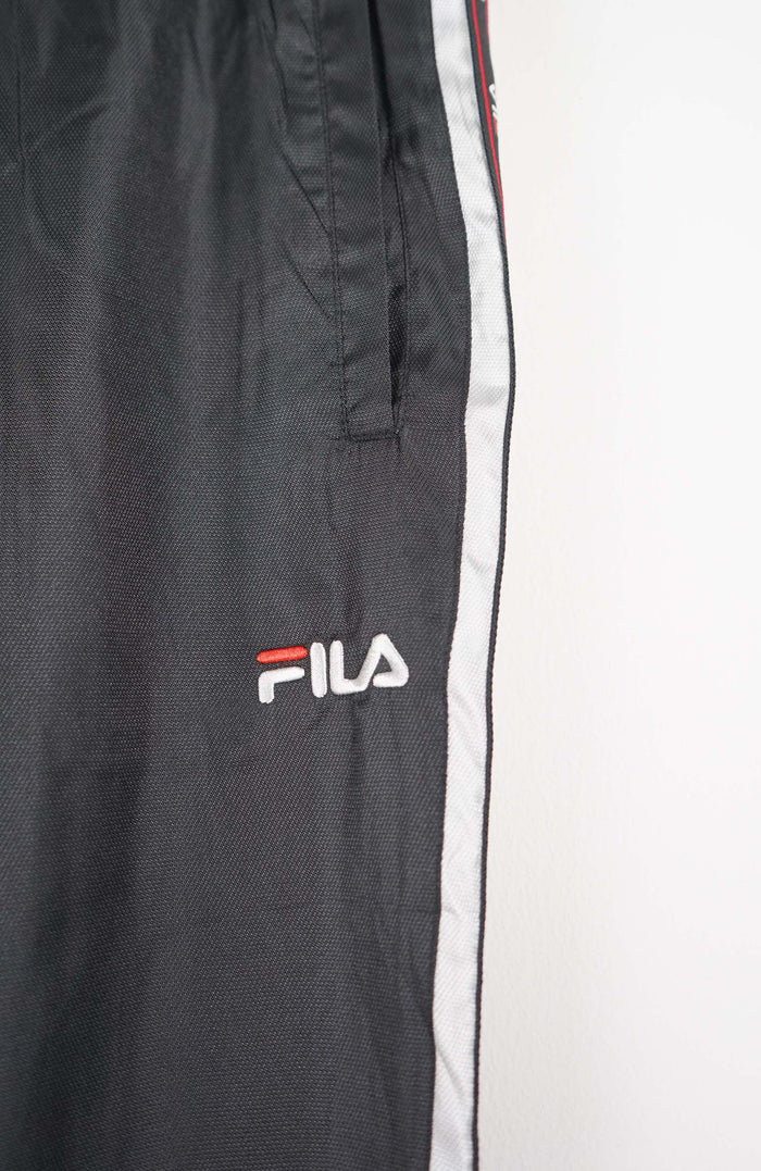 VINTAGE FILA TRACK PANTS (S)