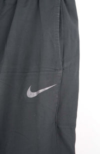 VINTAGE NIKE TRACK PANTS (M)
