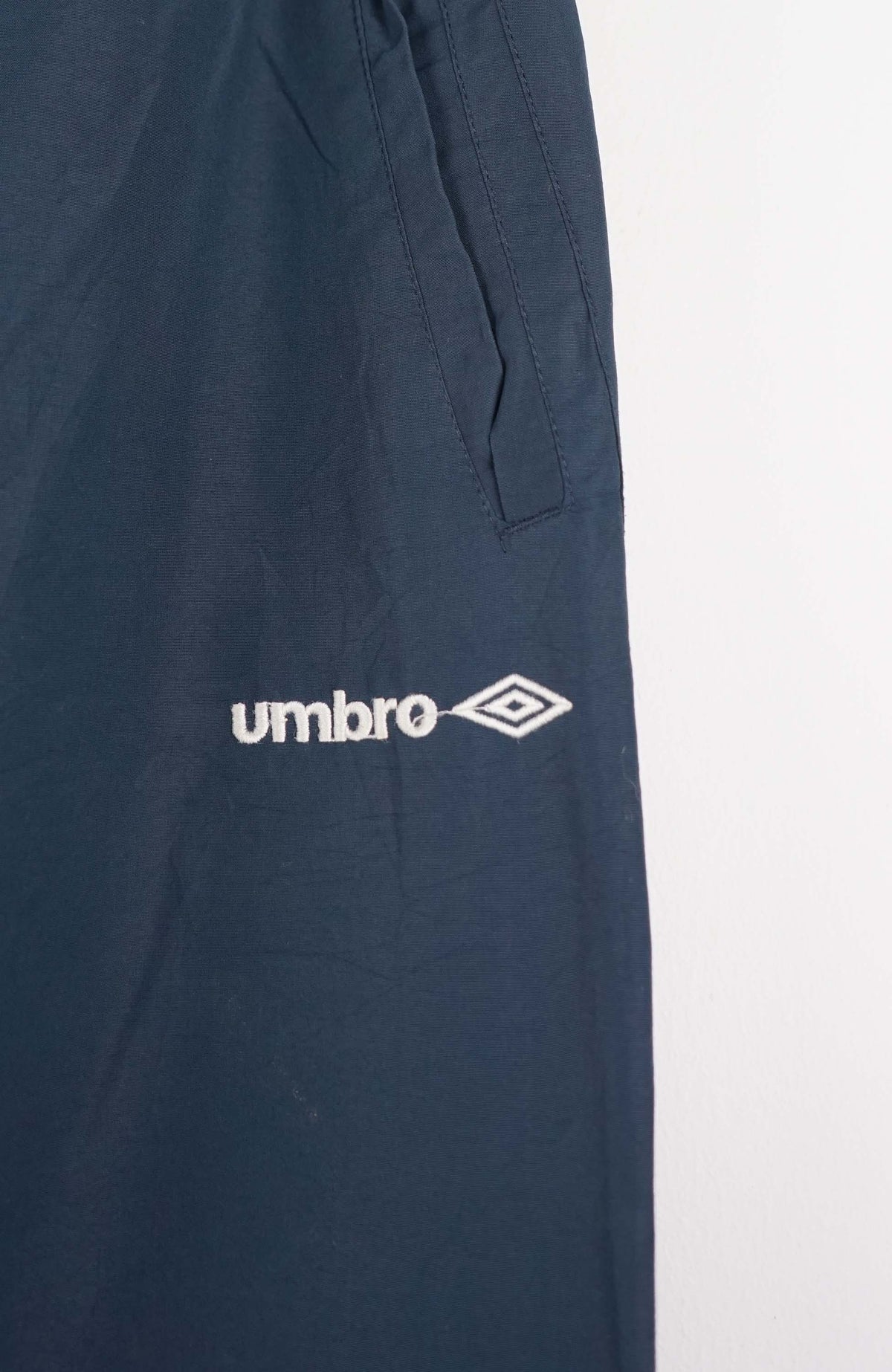 VINTAGE UMBRO TRACK PANTS (L)