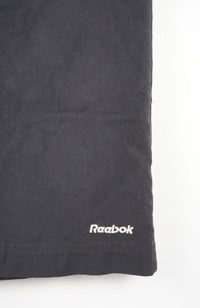 VINTAGE REEBOK 3/4 TRACK PANT SHORTS (L)