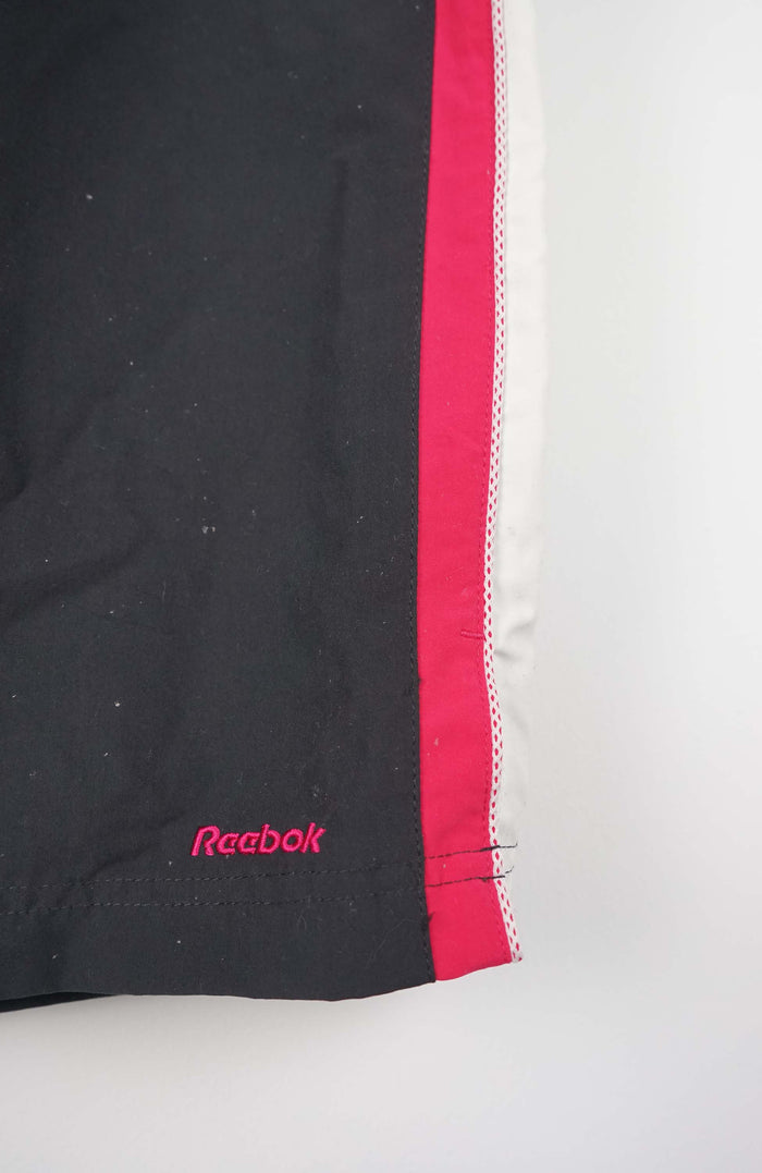 VINTAGE REEBOK 3/4 TRACK PANT SHORTS (XL)