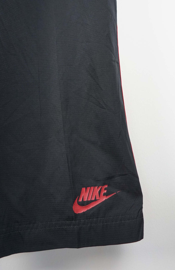VINTAGE NIKE TRACK PANTS (L)