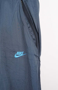VINTAGE NIKE TRACK PANTS (XL)