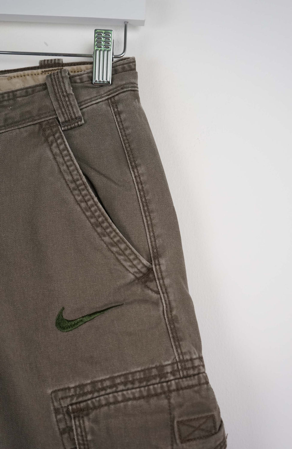 Brown cargo shorts on a white background