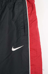VINTAGE NIKE TRACKPANTS (S)