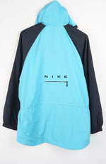 Blue and black Nike jacket on a white background