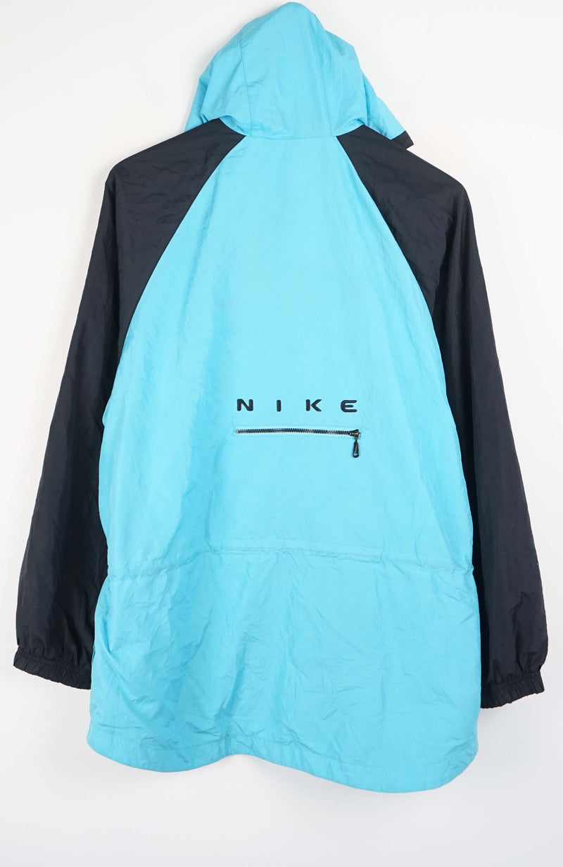 Blue and black Nike jacket on a white background
