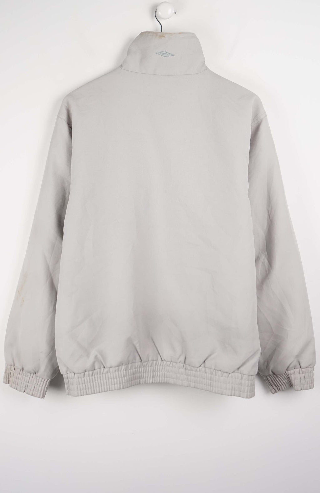 Gray jacket with a blue stripe on a white background