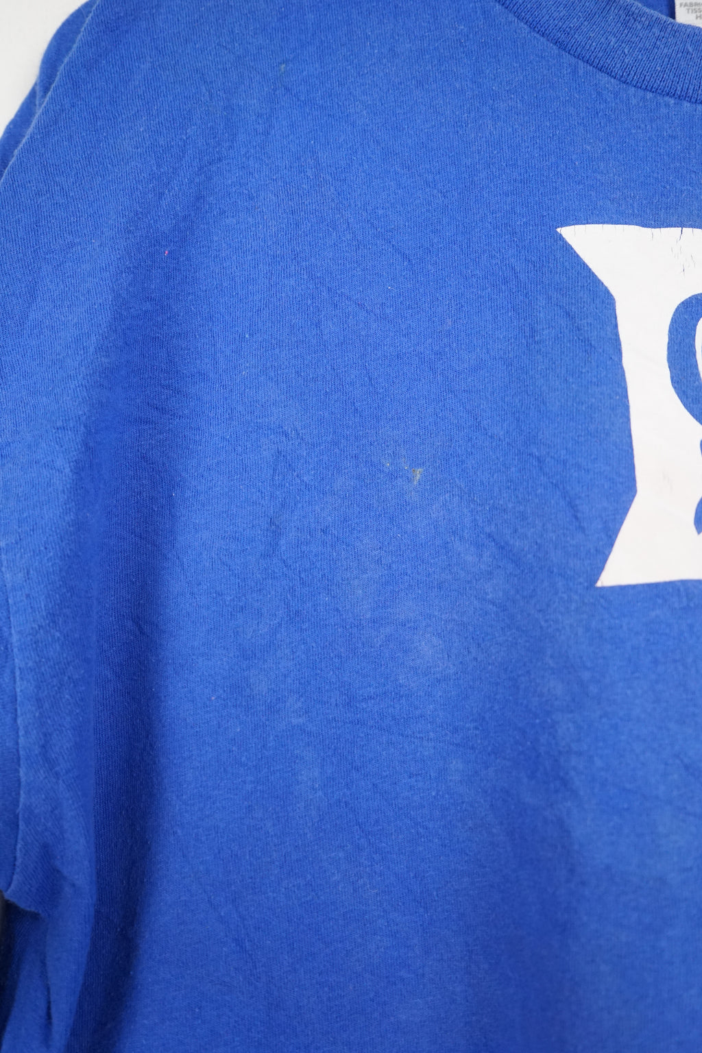 Blue long-sleeve shirt with a logo on a white background