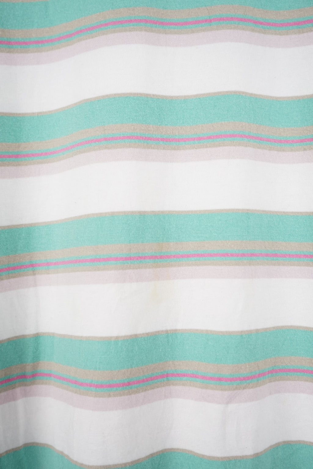 Striped shirt with green and gray horizontal stripes on a white background