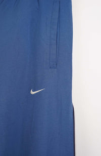 VINTAGE NIKE TRACK PANTS (L)
