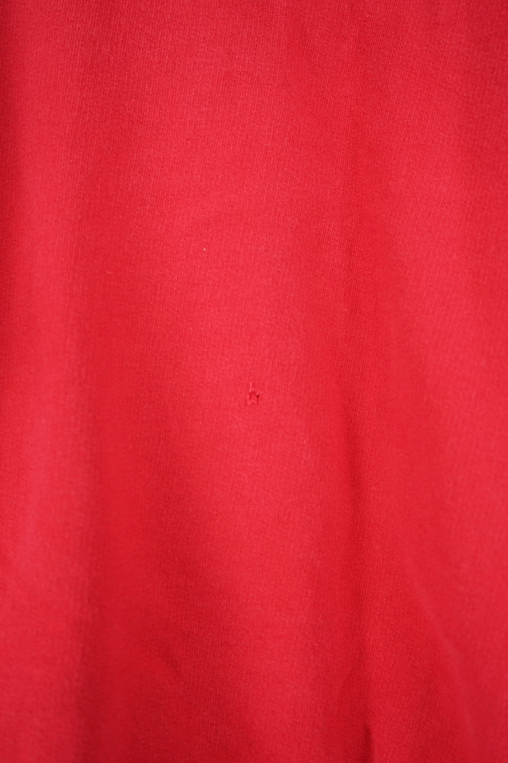Red sweatshirt with 'CHAPS Ralph Lauren' text on a white background
