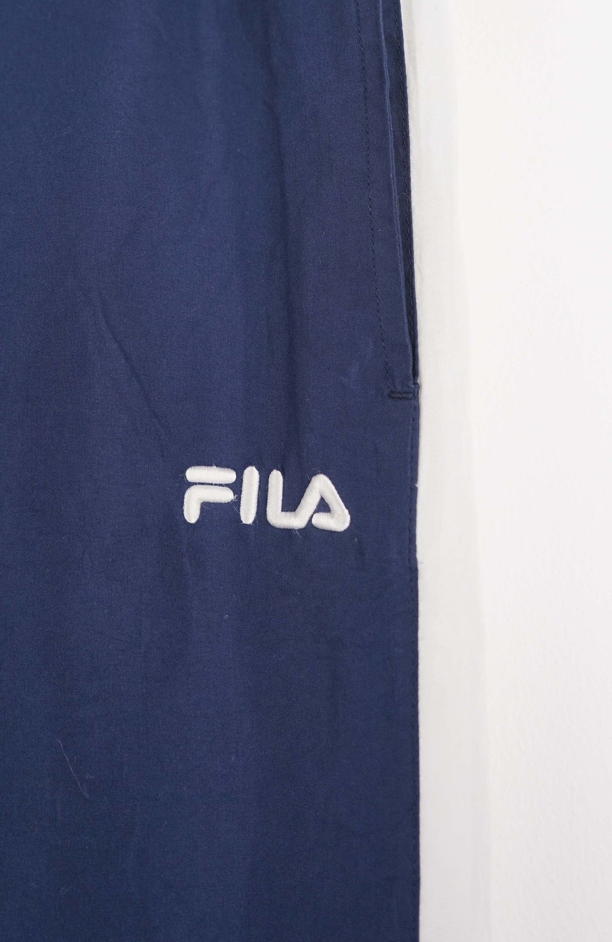 VINTAGE FILA TRACK PANTS (L)