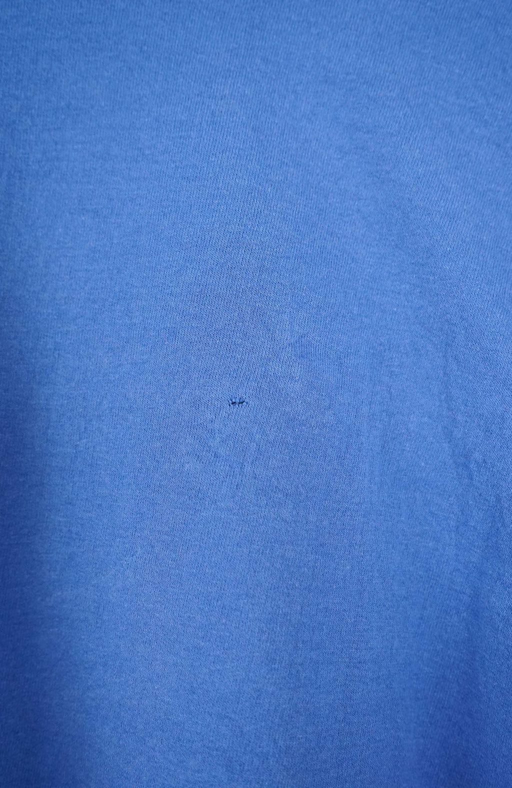 Blue sweatshirt with 'Kentucky Wildcats' text on a white background