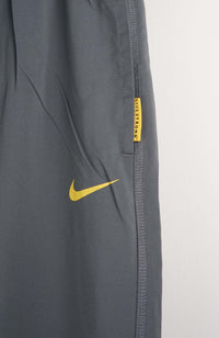 VINTAGE NIKE TRACK PANTS (L)