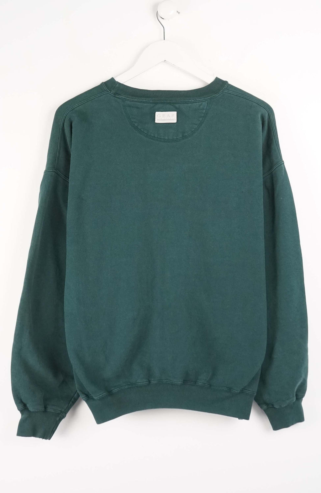 Green sweatshirt with 'University of Oregon Ducks' text on a white background