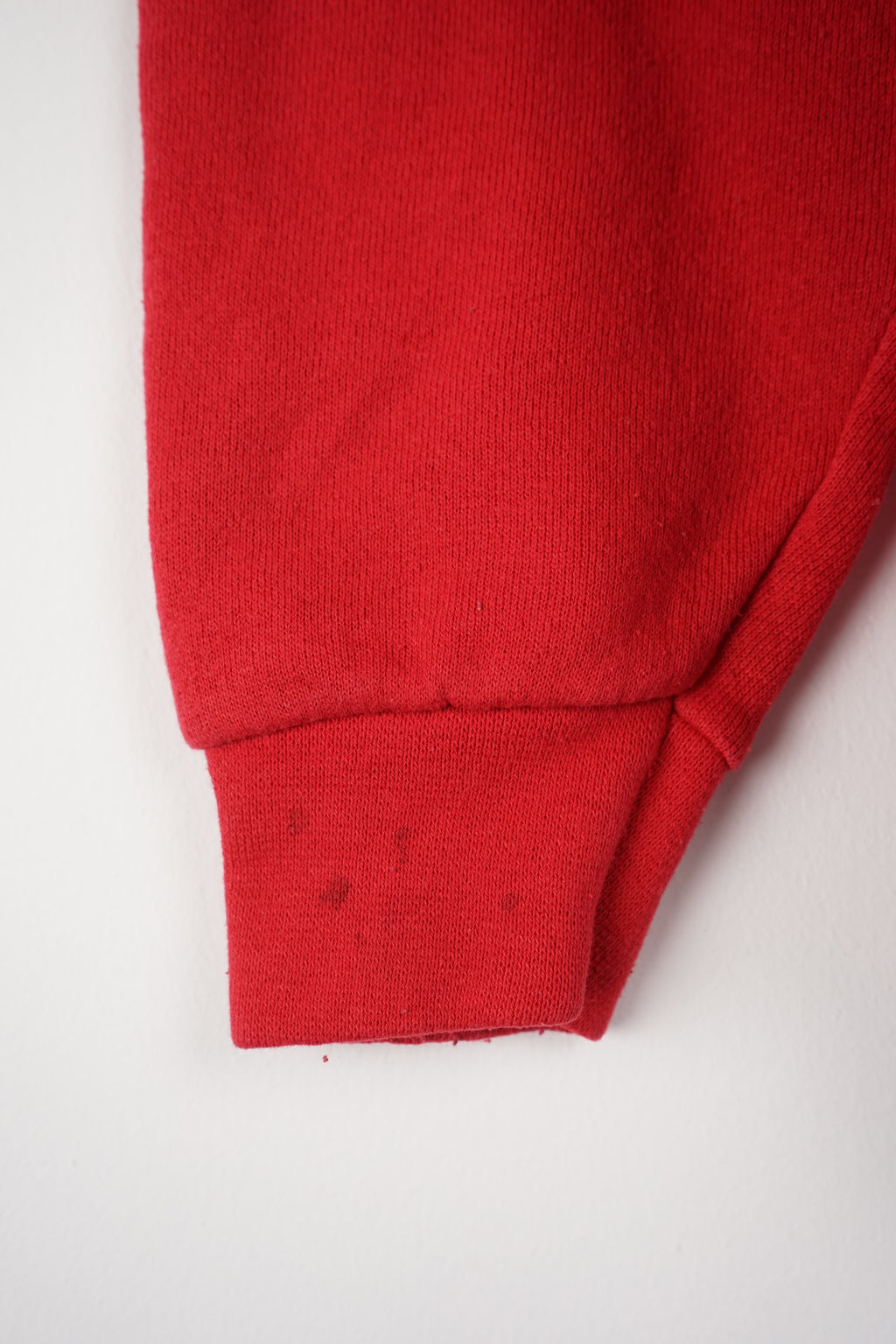 Red sweatshirt with 'Cleveland' and 'Central Champions' text on a white background