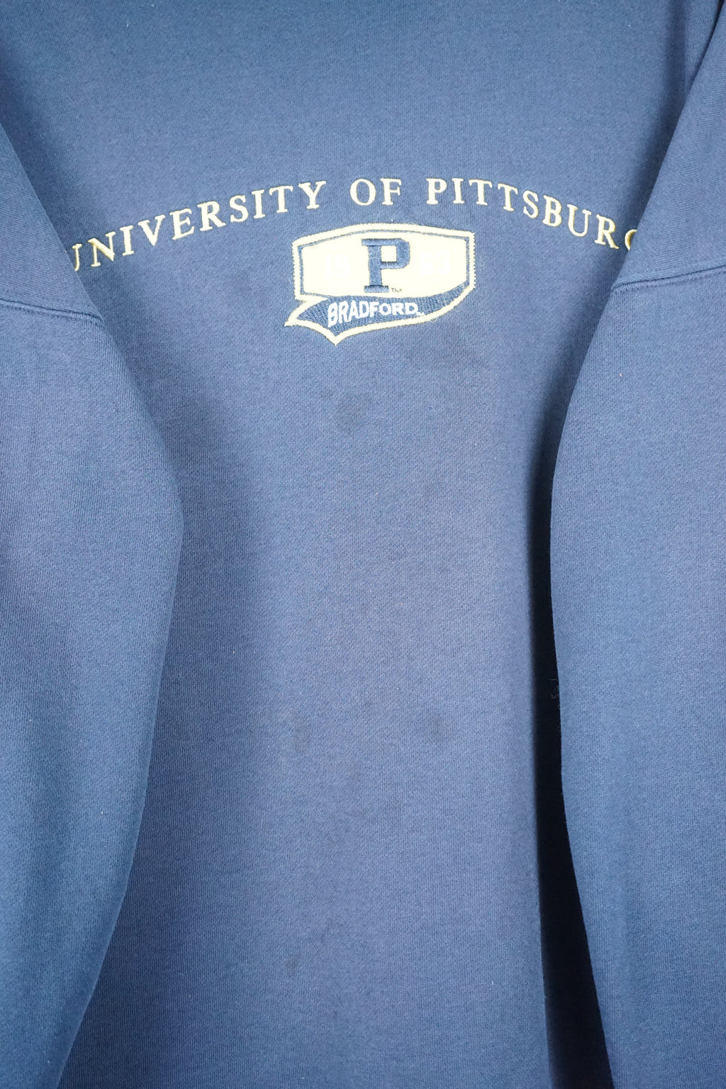 Navy blue sweatshirt with 'University of Pittsburgh' logo on a white background