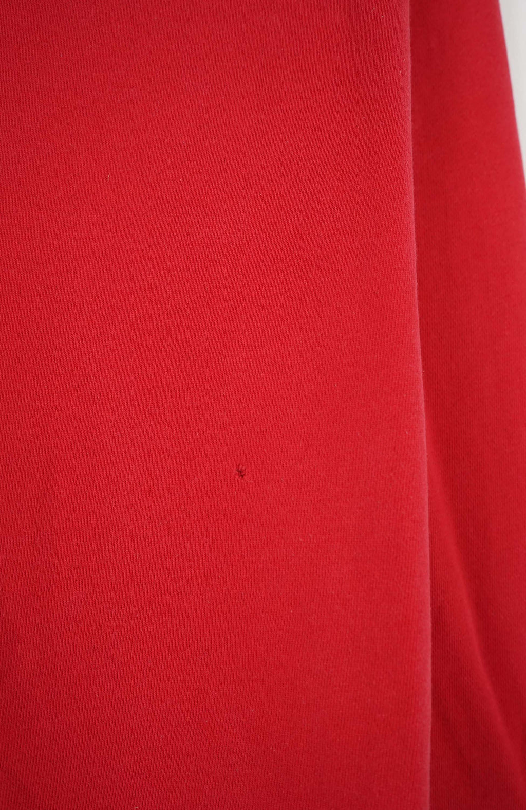 Red sweatshirt with Ralph Lauren logo on a white background