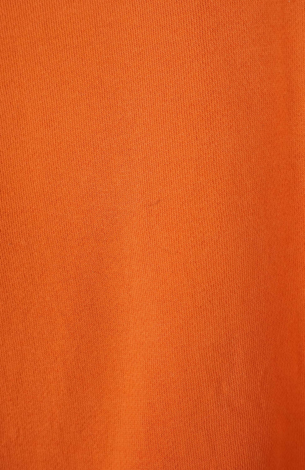 Orange sweatshirt with 'Athletic' text on a white background