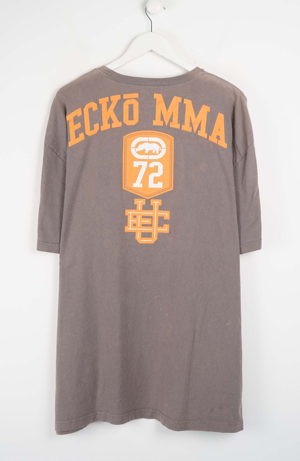 Gray t-shirt with orange and white graphics on a white background