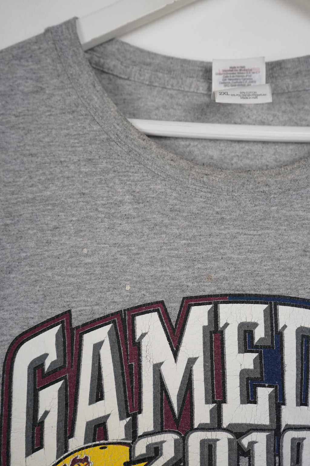 Gray t-shirt with 'Gameday 2010' graphic on a white background