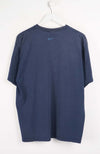 Blue t-shirt with Nike logo on a white background