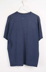 Blue t-shirt with Nike logo on a white background