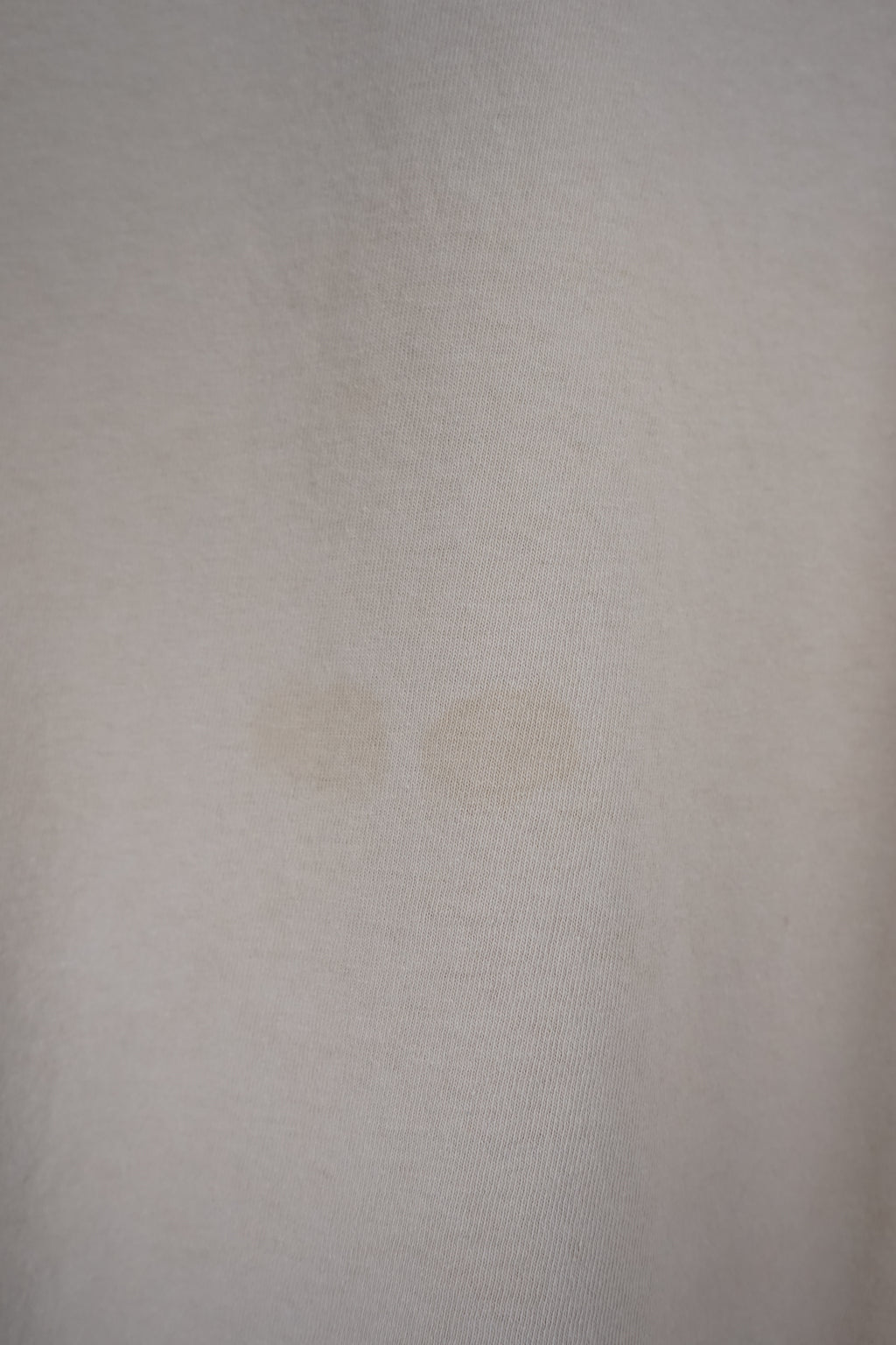 Beige t-shirt with 'Amberock Dark Lager' text on a white background