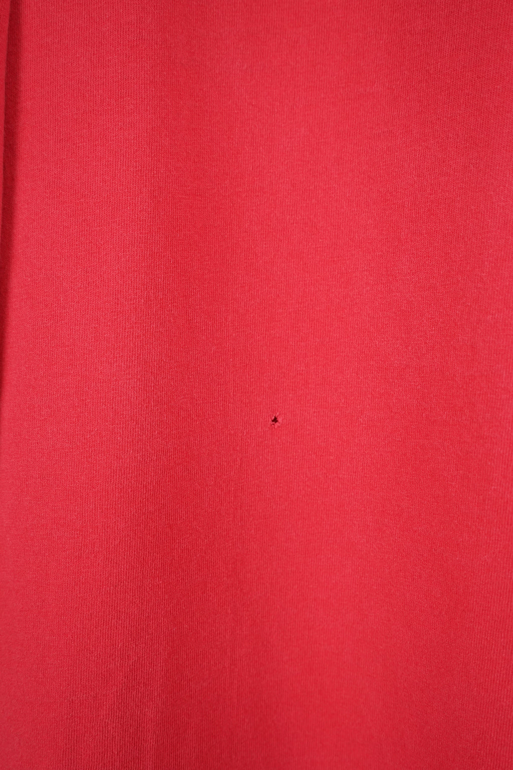 Red long-sleeve shirt with Ohio State University logo and Nike branding on a white background