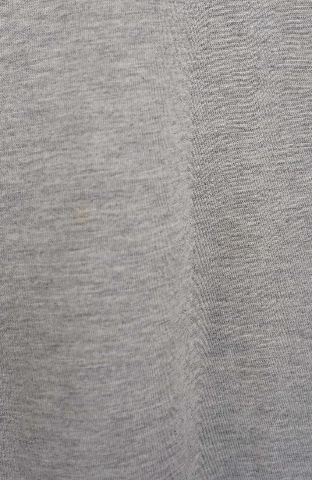 Gray t-shirt with a Nike logo on a white background